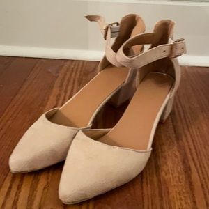 Velvety soft light pink one strapped low heel shoe